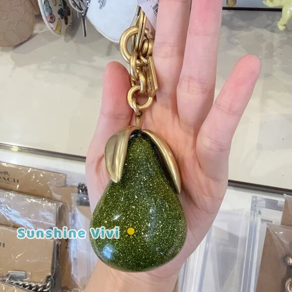 NWT Coach Pear Bag Charm CAX73 Brass/Green Multi - Picture 1 of 6